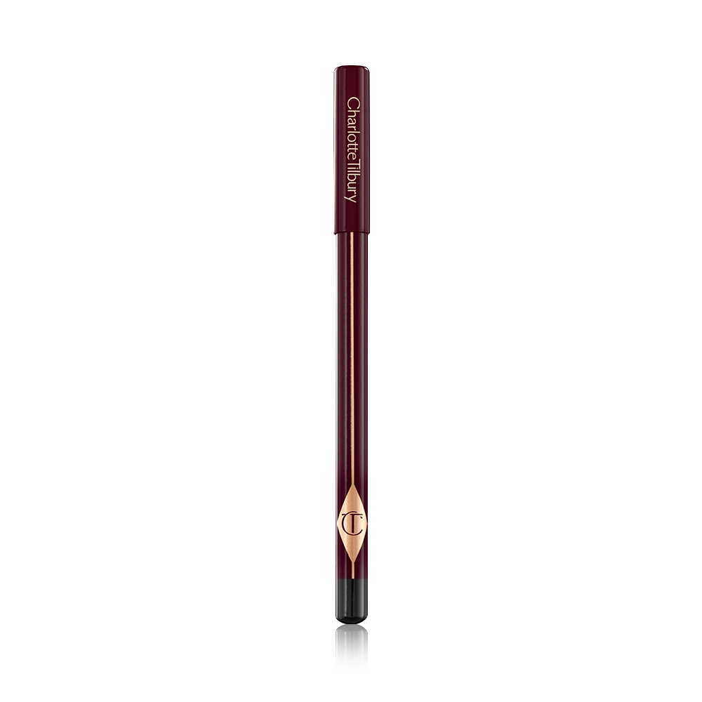 A closed, eyeliner pencil in burgundy packaging with the CT logo printed on it. 