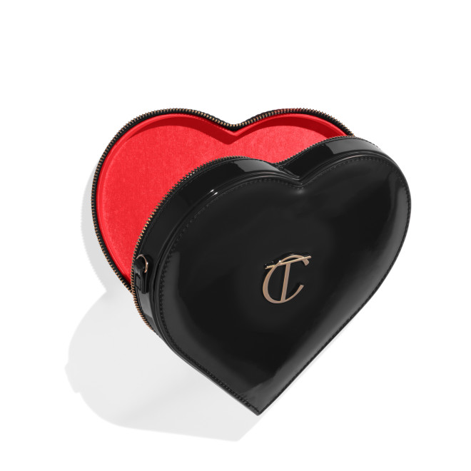 Charlotte's heart shaped bag in black - open