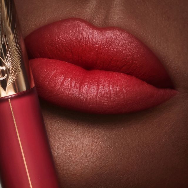 Lip close up wearing Ruby Blur liquid lipstick for National Lipstick Day