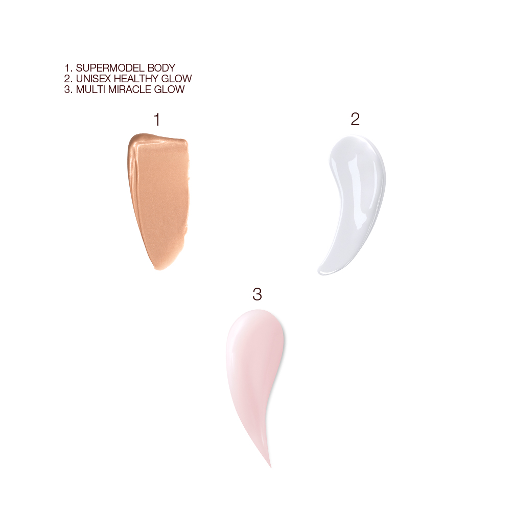 Swatches of a glowy body highlighter in a fawn shade, pearly-white primer, and three-in-one cleansing balm in a light pink shade.