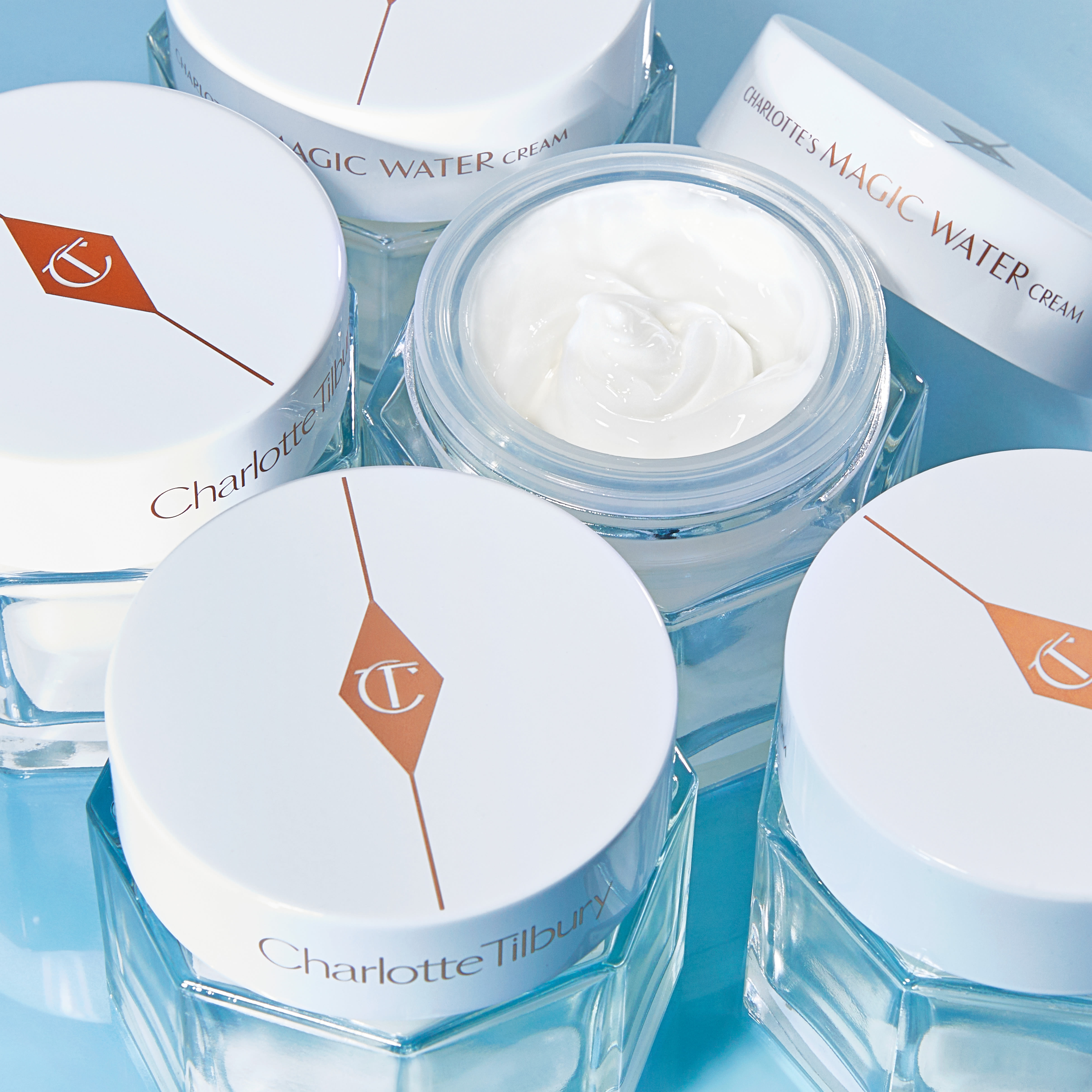 Multiple jars of Charlotte's Magic Water Cream hydrating gel moisturiser