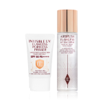 SPF-infused primer in a white-coloured tube with a setting spray in a large bottle with a gold-coloured lid.