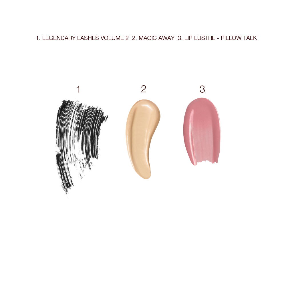 Swatches of black mascara, liquid concealer in a light shade, and creamy lip gloss in a nude pink colour. 