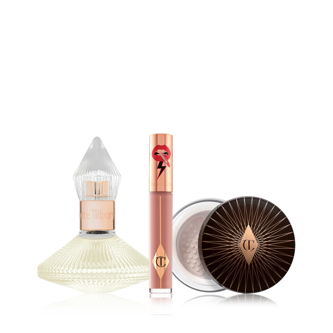 A 100 ml perfume in a glass bottle with with a glass lid with a liquid lipstick in a nude brown shade with a golden-coloured lid, and loose powder with a black and gold-coloured lid. 