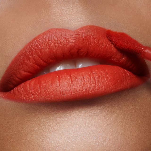Close up of Flame Blur flame red lipstick for medium skin
