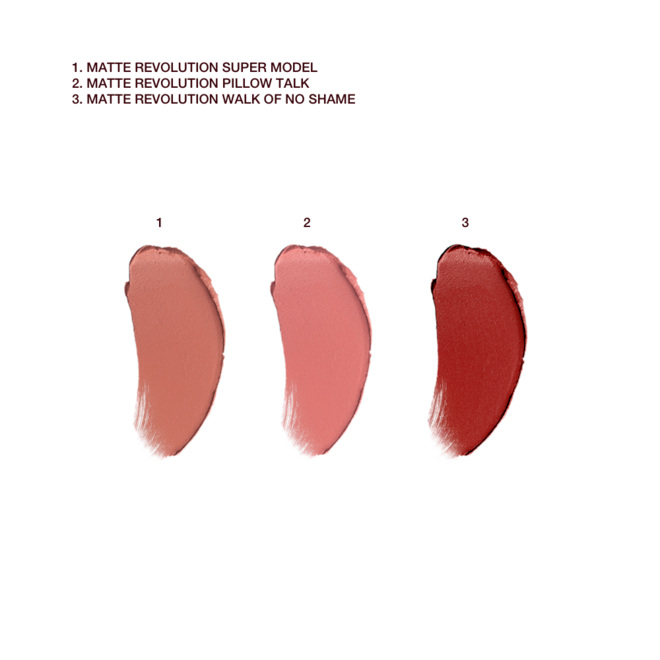 Iconic Mini Lip Trio swatches Swatches of three matte lipsticks in the shades brick-red, nude pink, and peachy-brown.