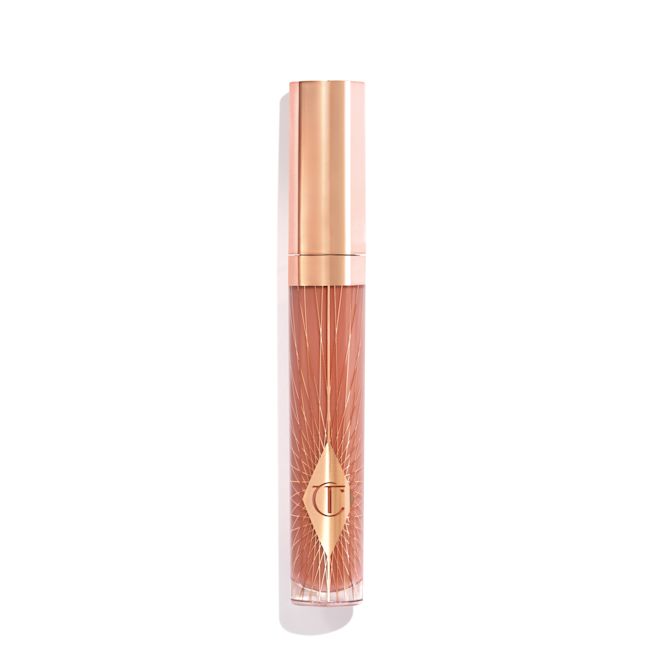 Collagen Lip Bath Lip Gloss in Pillow Talk Closed, standard-sized nude-pink lip gloss with a CT symbol on the tube and a rose gold lid.
