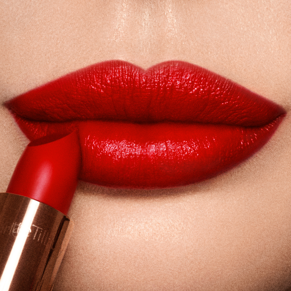 Kissing Lipstick in So Red satin finish neutral red lipstick