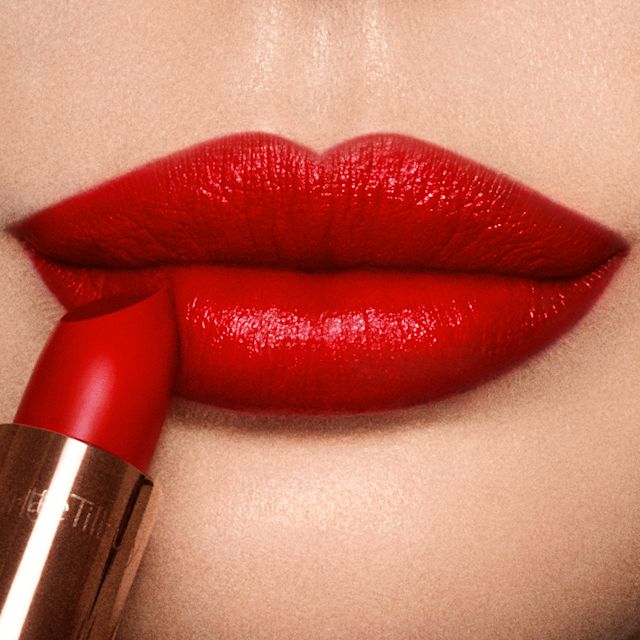 Kissing Lipstick in So Red satin finish neutral red lipstick