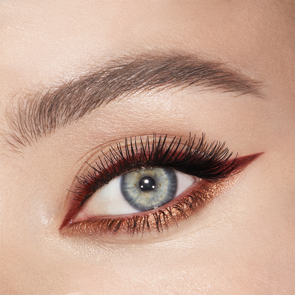 Eye close up of model wearing Eye Colour Magic Liner Duo in Copper Charge