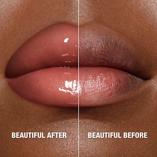 Pillow Talk Big Lip Plumpgasm - Fair/Medium on deep skin tone model Pillow Talk Big Lip Plumpgasm - Fair/Medium on deep skin tone model