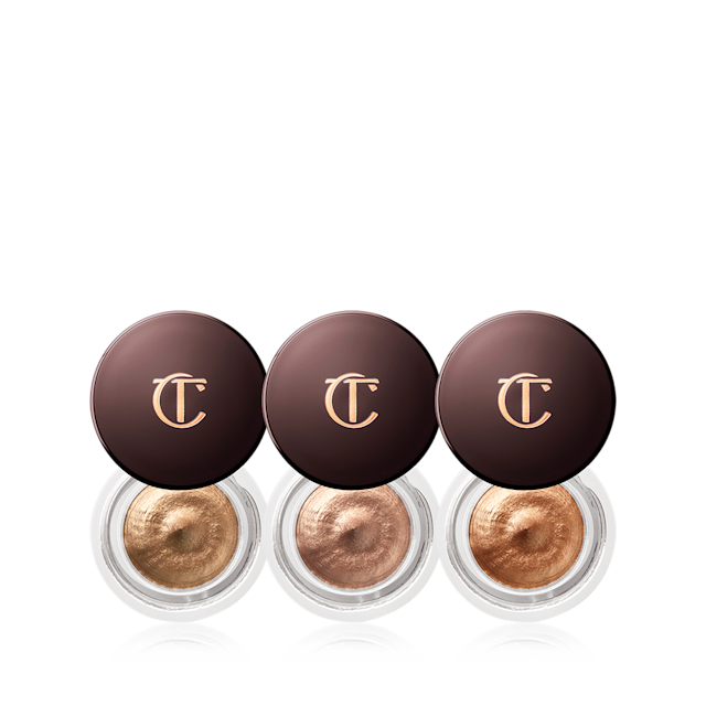 Trois pots d'ombres à paupières crème Eyes to Mesmerise dans des teintes dorées
