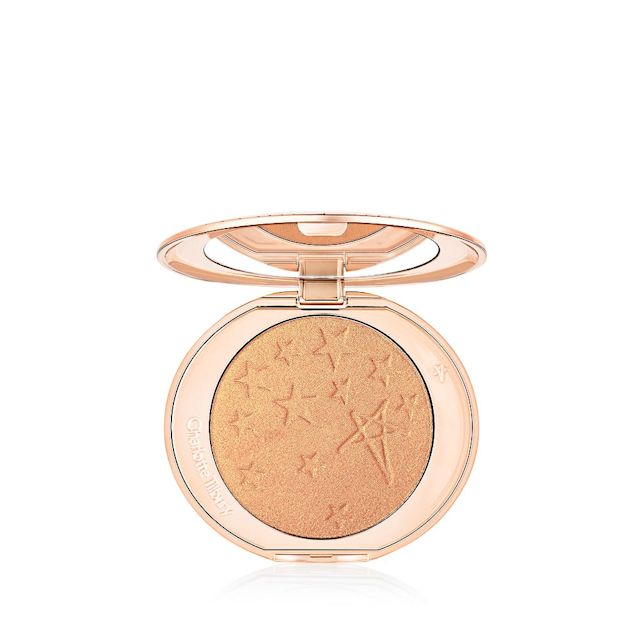 Charlotte's Hollywood Glow Glide Face Architect Highlighter in Gilded Glow, a true yellow-gold pressed highlighter