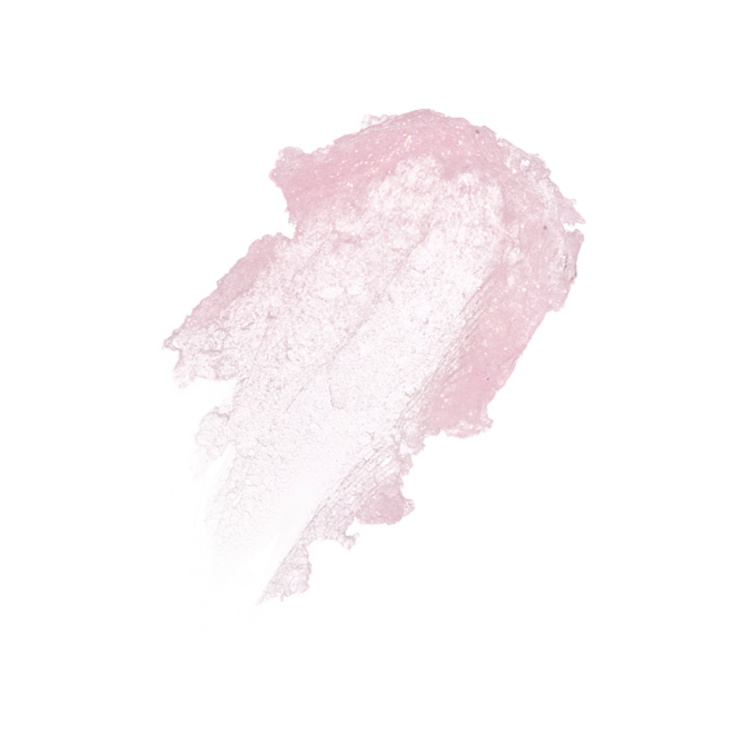 Glowgasm Lips in Glittergasm swatch Swatch of a glittery light pink sheer lipstick.