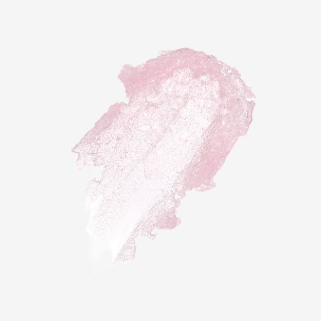 Glowgasm Lips Glittergasm Swatch Shot PDP Swatch of a glittery light pink sheer lipstick.