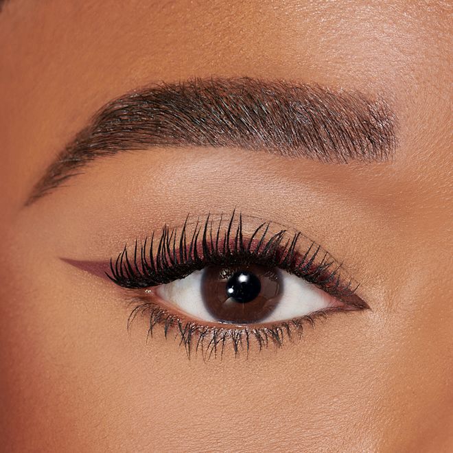 Pillow Talk Push Up Eye Kit on deep skintone model Pillow Talk Push Up Eye Kit on deep skintone model