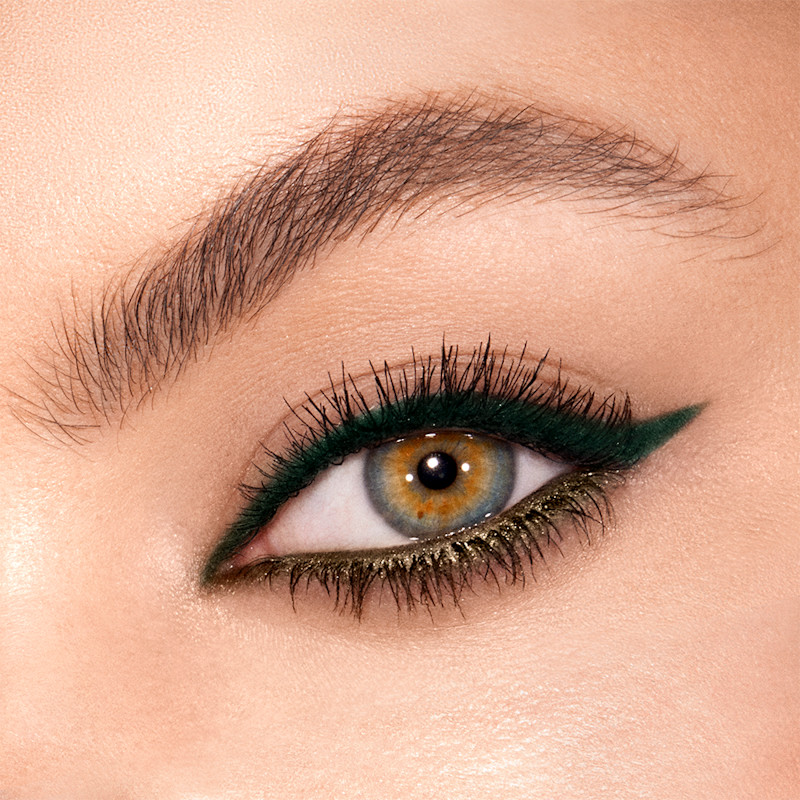 Model eye close up wearing a green eye makeup look using Green Lights Liner Duo