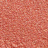 Close-up swatch of a shimmery, cream eyeshadow in a russet rose shade.