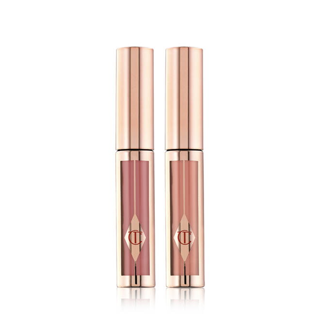 Two, closed liquid lipsticks in a gold colour scheme in shades of nude peach-brown, and nude rose-brown. 