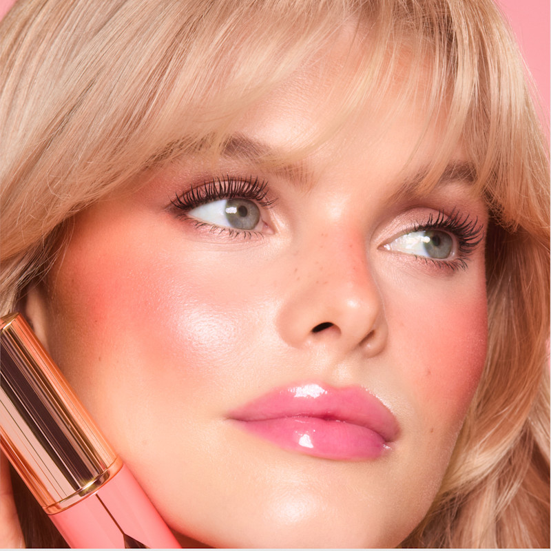 Model wearing Peachy Glow for a golden hour blush look