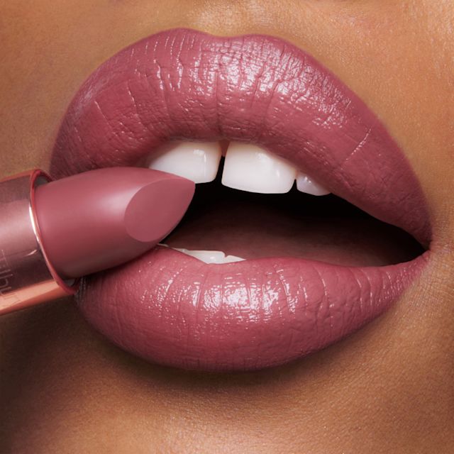 Model wearing 90s Pink lip liner and lipstick combination