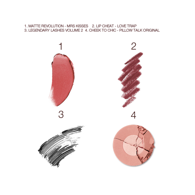 Mrs Kisses Bundle swatches Swatches of a warm pink matte lipstick, a dark-pink lip liner, black mascara, and two-tone powder blush in nude pink.