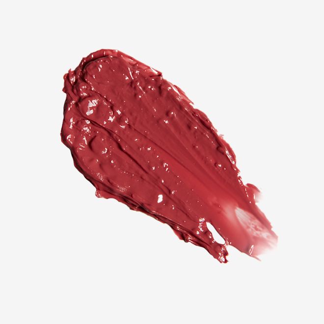 Hyaluronic Happikiss in Happilove swatch Swatch of a moisturising lipstick balm in a cherry-red shade.