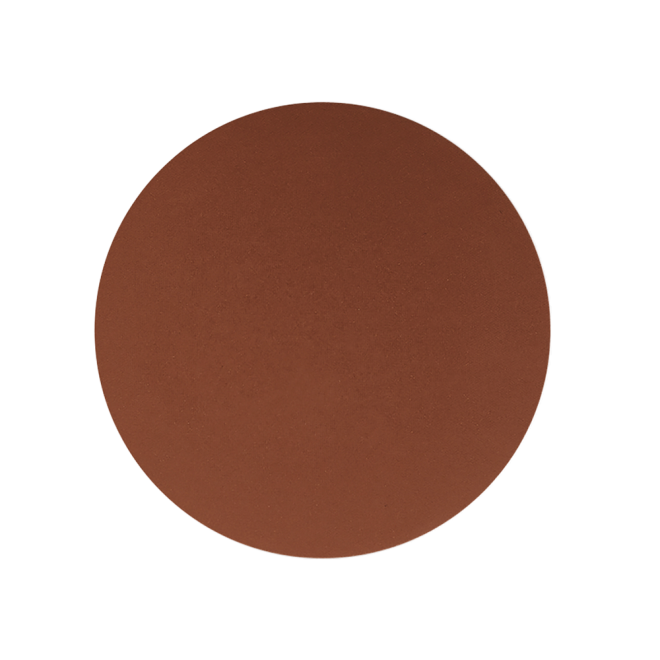 Swatch of a finely-milled bronzer in a dark brown shade, which is perfect for deep tones. 