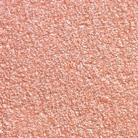 Swatch of a golden pink duo-chrome-effect cream eyeshadow with a duo-chrome metallic finish.