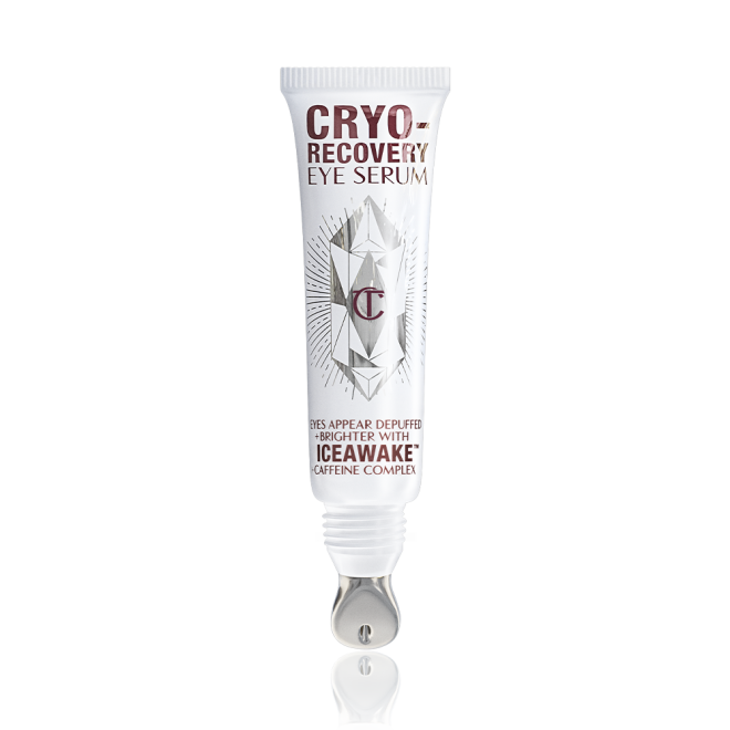 An open, white-coloured eye serum tube with silver-colour geometric patterns on the front and text written on it that reads, 'eye appear depuffed and brighter with Iceawake, caffeine complex'