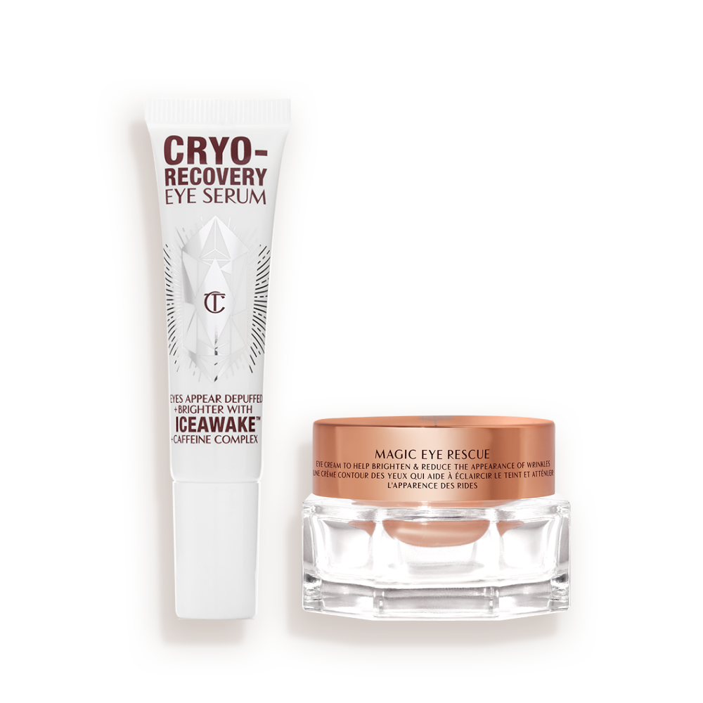 An open, white-coloured eye serum tube with silver-colour geometric patterns on the front and text written on it that reads, &#x27;eye appear depuffed and brighter with Iceawake, caffeine complex&#x27; and an open, champagne-coloured thick, eye cream in a glass pot with a gold-coloured lid.