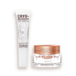 An open, white-coloured eye serum tube with silver-colour geometric patterns on the front and text written on it that reads, 'eye appear depuffed and brighter with Iceawake, caffeine complex' and an open, champagne-coloured thick, eye cream in a glass pot with a gold-coloured lid.