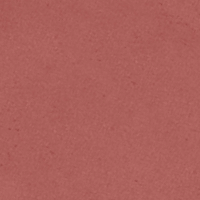 Swatch of a lipstick in a warm peach-nude lipstick with a matte finish.