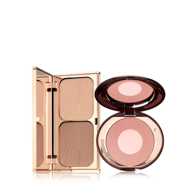 An open contouring and bronzing duo in a compact with a mirrored lid with an open, two-tone blush compact in a muted pink shade with a mirrored lid. 