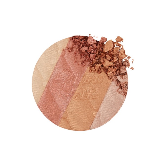 Swatch of a pressed powder highlighter compact in various shades of pink and gold for warm-tone complexions. 