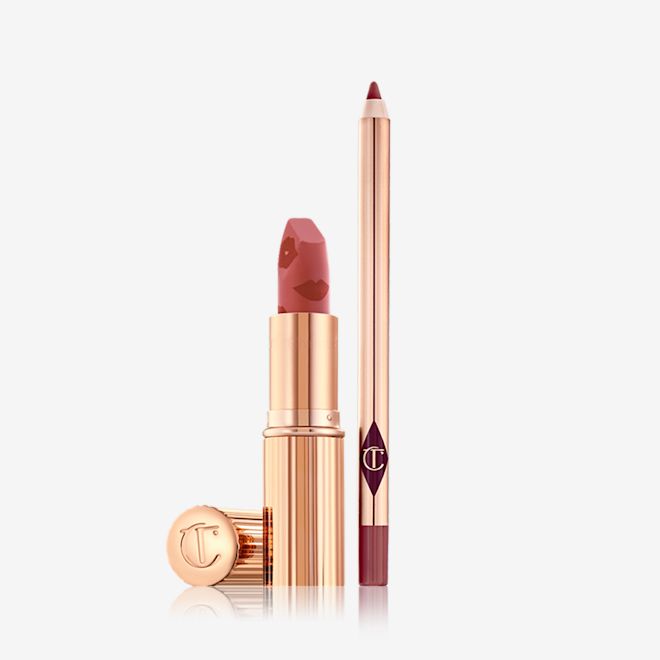 Luscious Lip Slick in Mrs Kisses open An open matte lipstick in a nude red shade with a lip liner pencil in redwood colour.