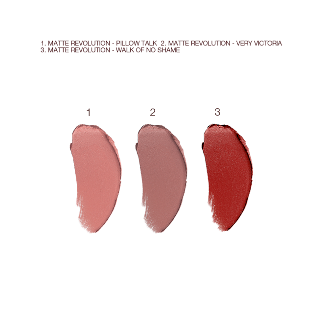 Charlotte's Iconic Mini Lip Wardrobe swatches Swatches of three matte lipsticks in nude pink, pale pink, and berry-rose.