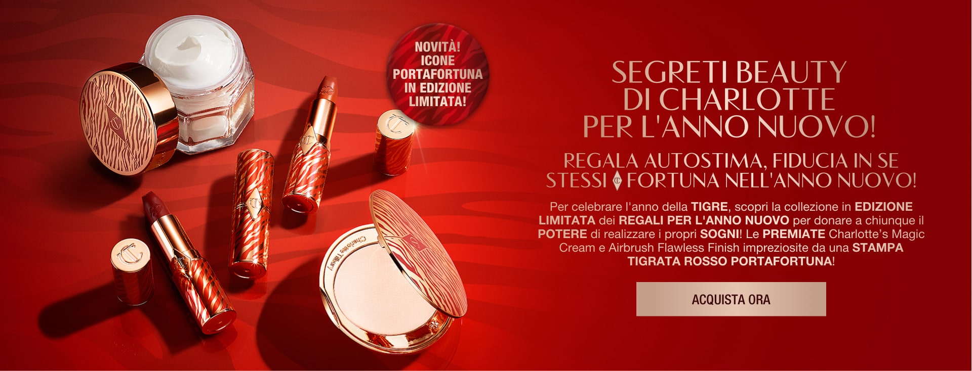 Red-coloured banner with an open jar of pearly-white white cream, open lipstick tubes, and an open pressed powder compact with a mirrored lid in gold packaging, all products having red-coloured tiger stripes on them for the Lunar New Year, along with text on the banner that reads, 'New! Lucky limited-edition icons! gift empowerment, confidence & luck this new year!'