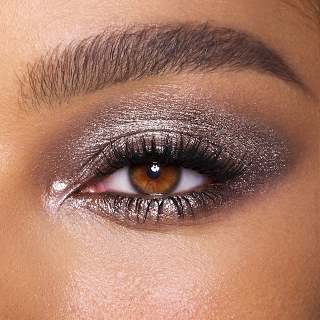 Model eye close up wearing a shimmery brown eyeshadow makeup look using Smokey Quartz Hypnotising Pop Shot