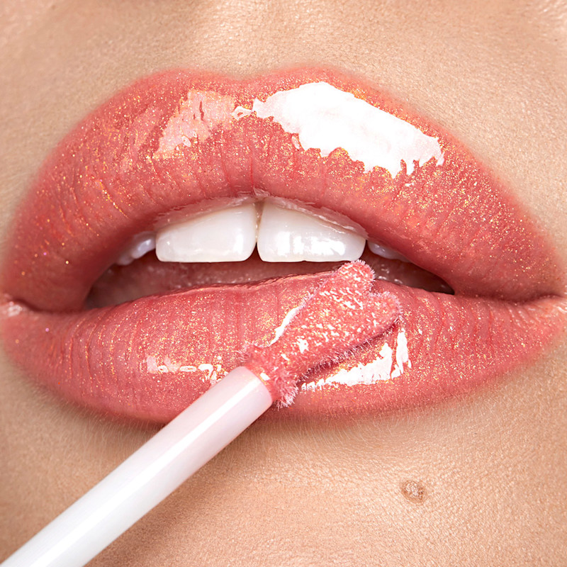 Lip close up wearing Peachy Plump Collagen Lip Bath for National Lipstick Day