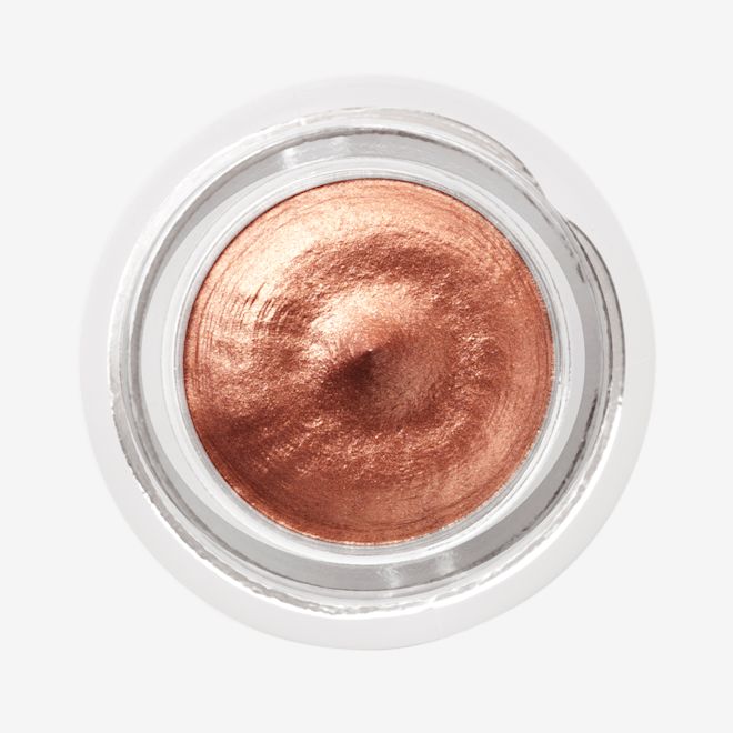 Eyes to Mesmerise in Copper Sunrise open Close-up of a coppery gold. cream eyeshadow in an open glass pot.