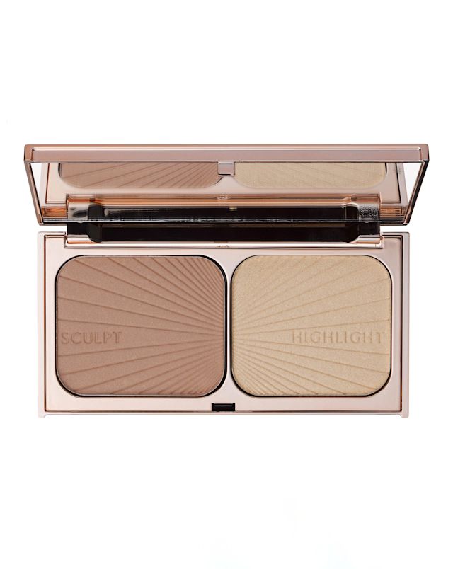 An open, mirrored-lid duo contour palette for light to medium skin tones in sleek rose-gold-coloured packaging. 