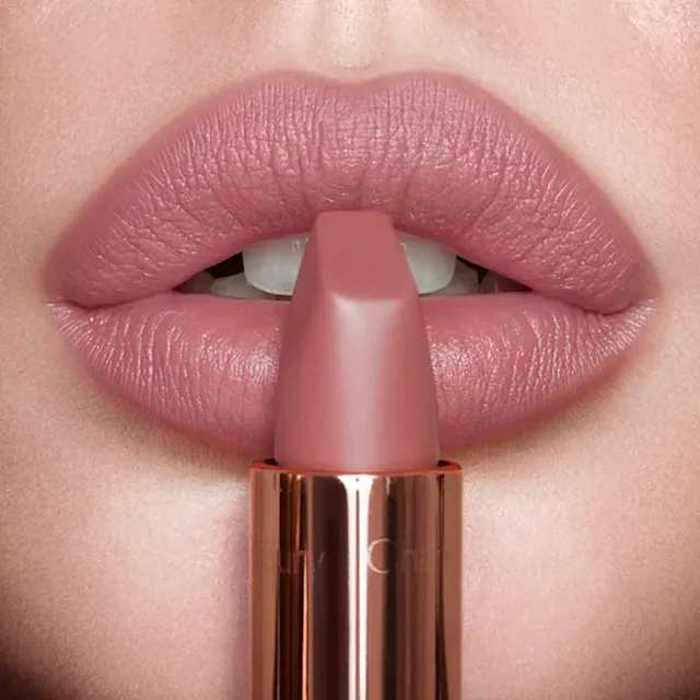 Model wearing Pillow Talk lip liner and lipstick combination