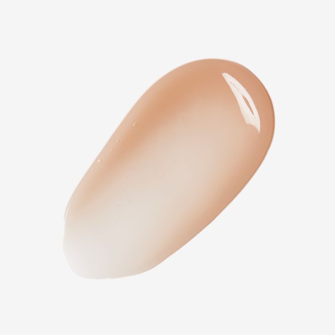 Super Radiance Resurfacing Facial swatch Swatch of a brown-champagne-coloured liquid exfoliating wash-off mask.