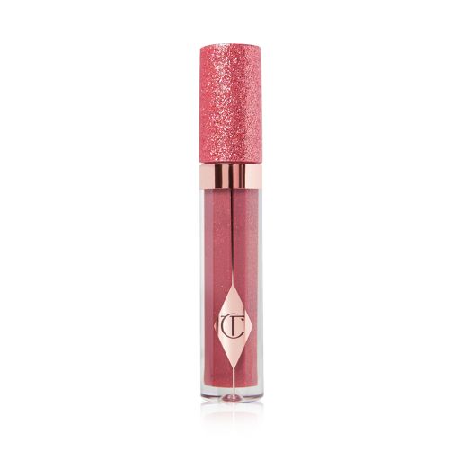 A berry-pink lip gloss in a glass tube with a shimmery strawberry-red lid. 