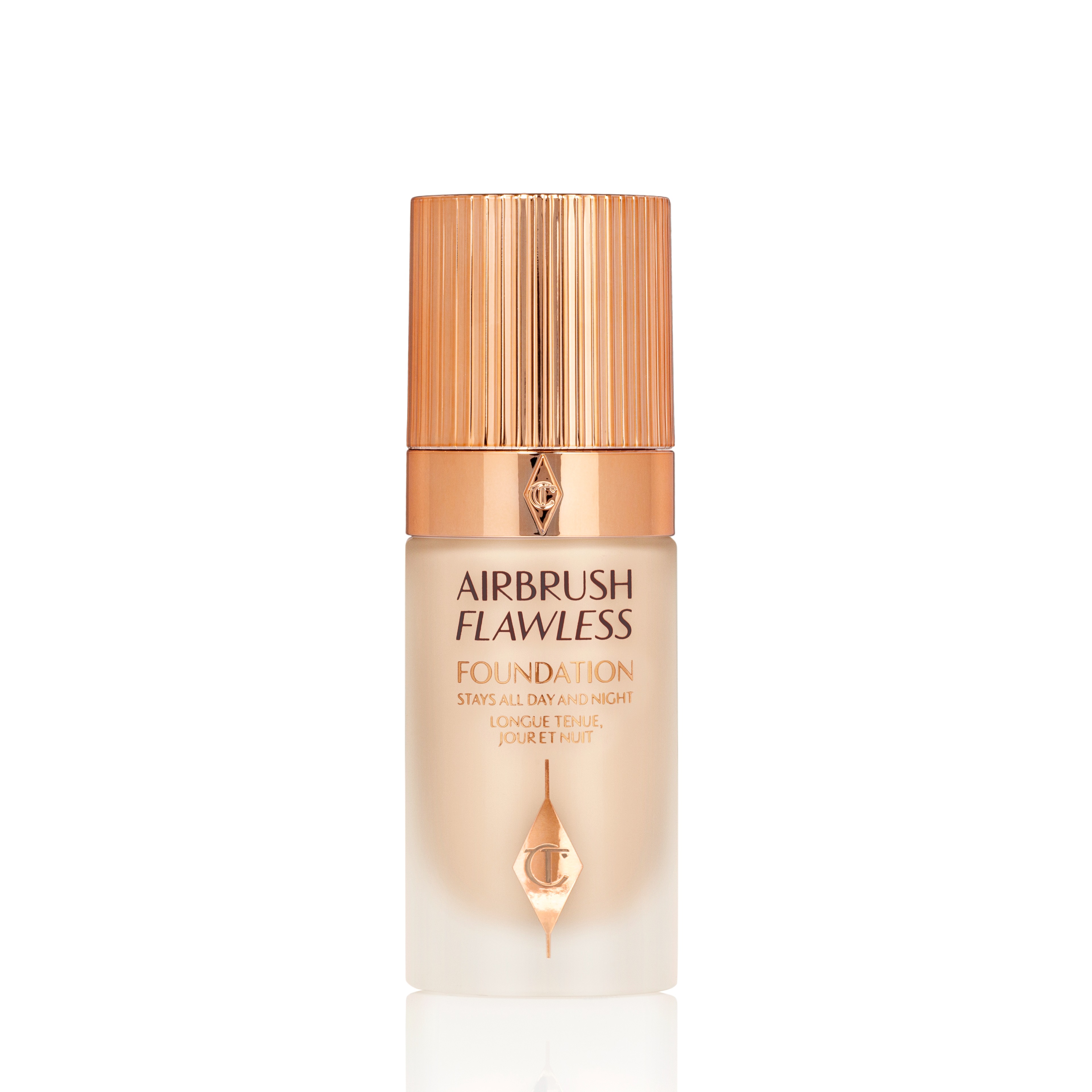 Light beige foundation in a frosted glass bottle shade with a gold-coloured lid.