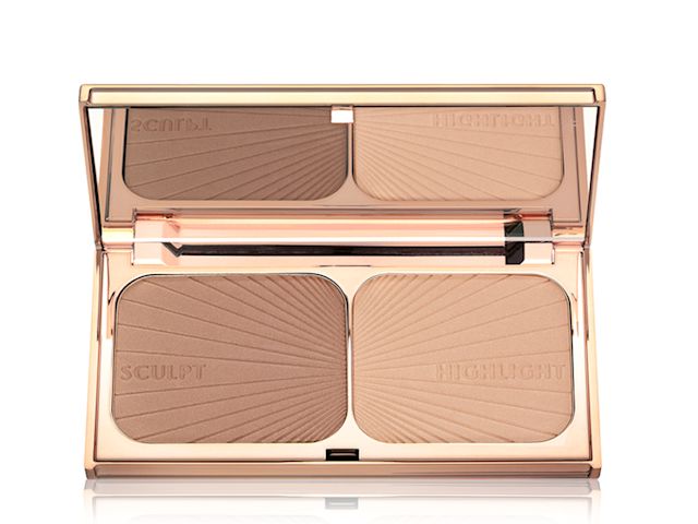 An open, mirrored-lid duo contour palette for light to medium skin tones in sleek rose-gold-coloured packaging. 