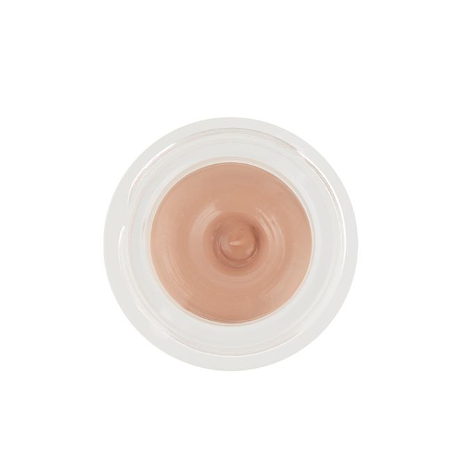 Eyes to Mesmerise in Nude Cashmere without lid An open frosted glass pot with a cream eyeshadow in a nude cashmere shade.