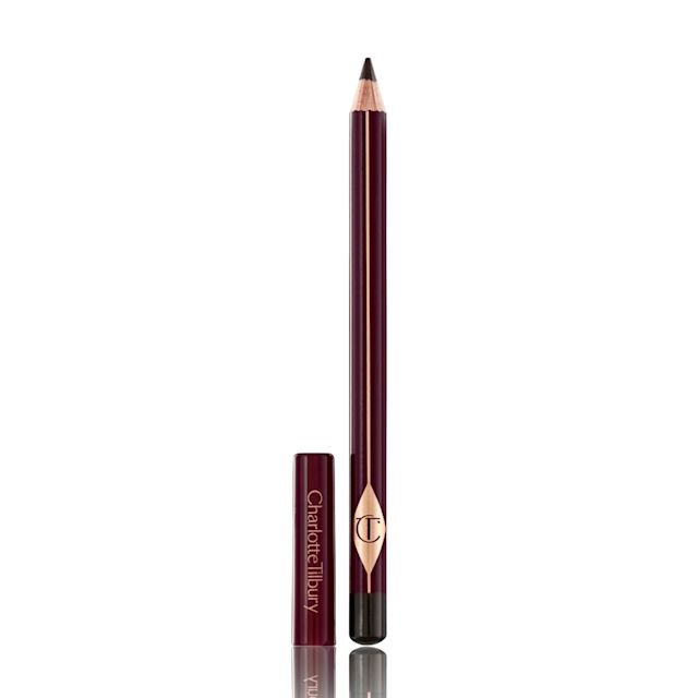 An open eyeliner pencil in a soft dark brown colour with its cap next to it. 