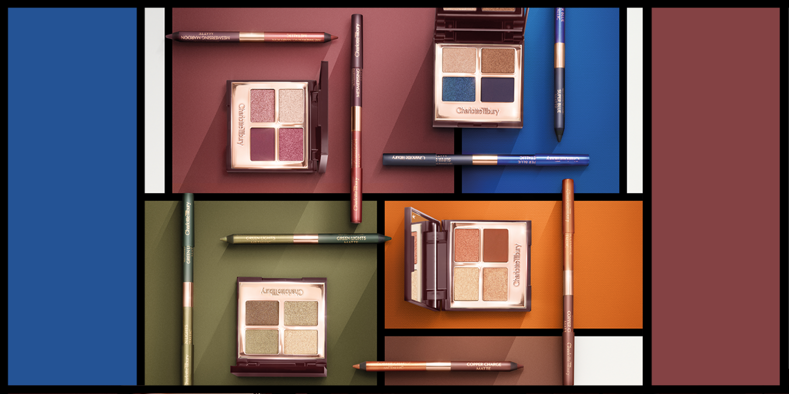 Various quad eyeshadow palettes and dual-ended eyeliner pens, all open, in shades of blue, copper, maroon, and green, placed on a complementary background. 